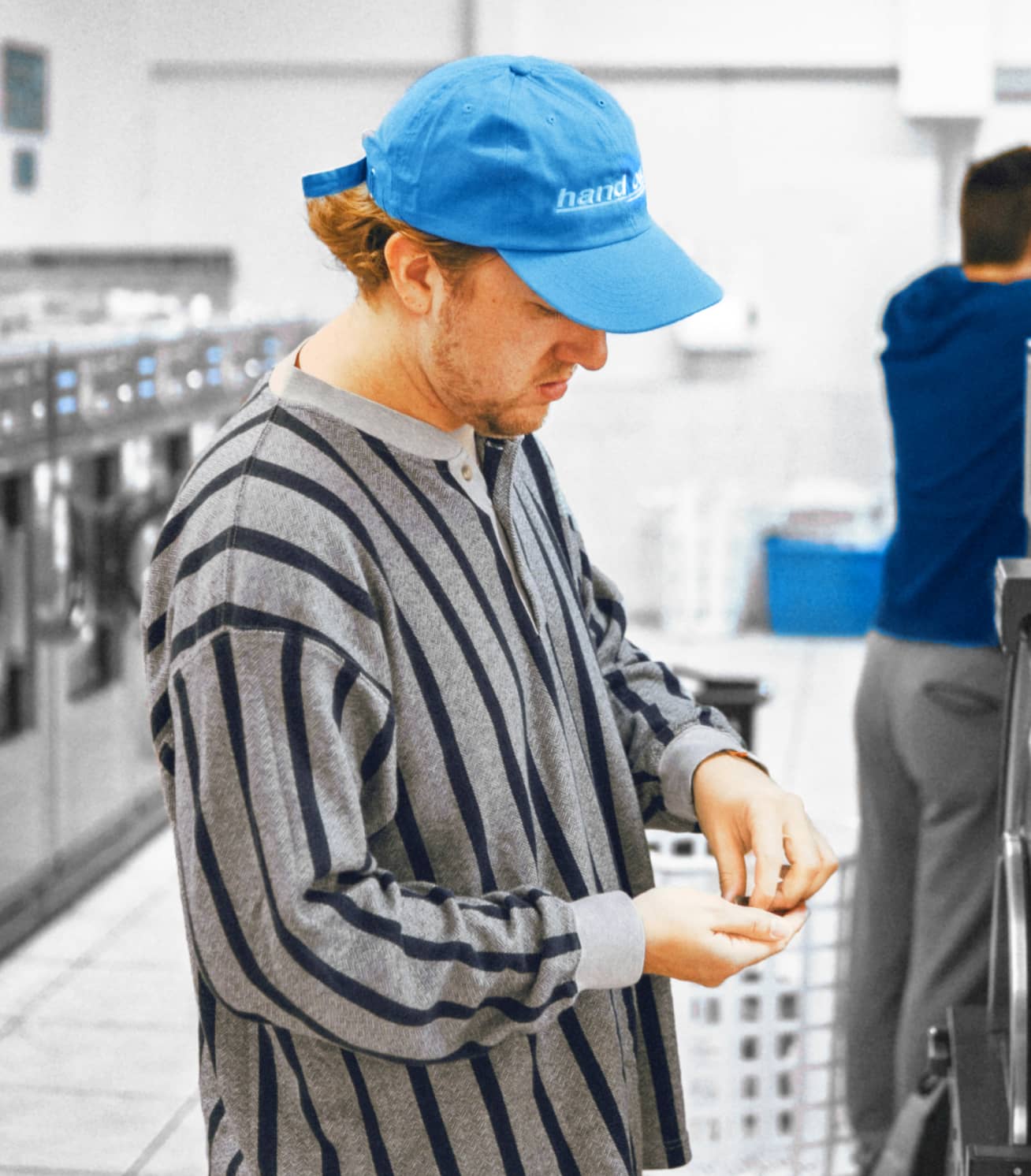 Quality Laundry Service With Free Collection & Delivery Man With Cap Paying Laundry Services - Laundry X Webflow Template